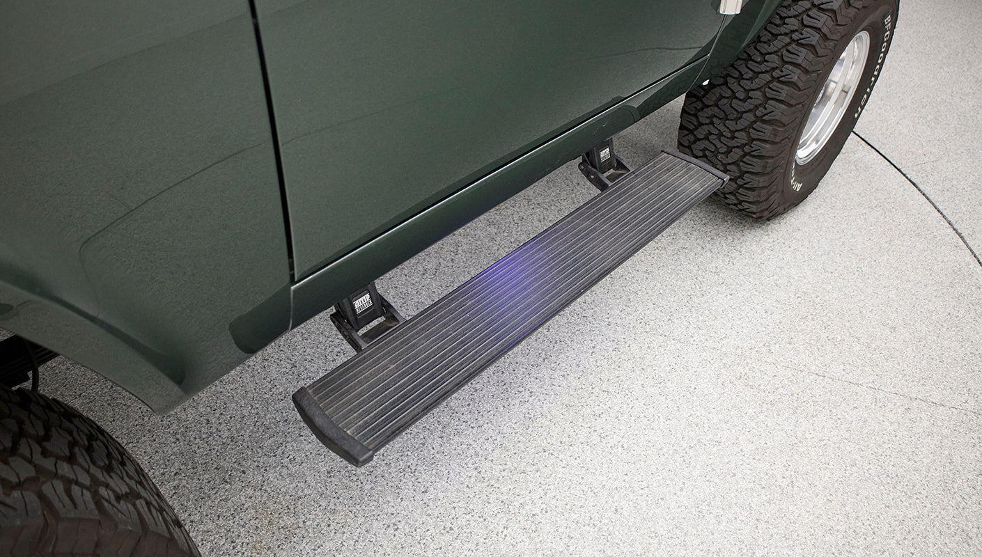 Fold-out side step attached under door of Classic Ford Bronco