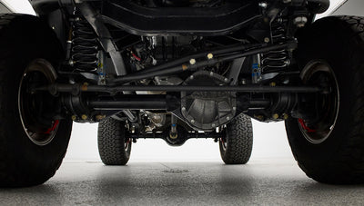 Undercarriage view showing front axle and steering components of Classic Ford Bronco