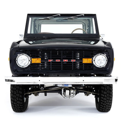 Front view of a black Classic Ford Bronco with windshield folded down on white background