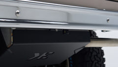 Rear bumper underside showing small black camera mounted near trailer hitch