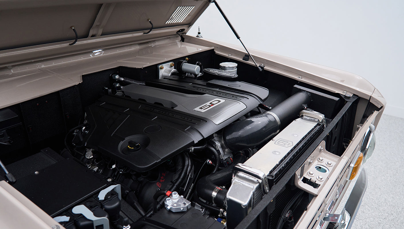 Engine bay showing 5.0-liter engine and radiator components in Classic Ford Bronco