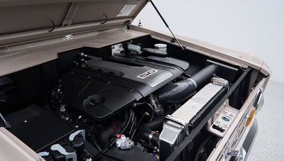 Engine bay showing 5.0-liter engine and radiator components in Classic Ford Bronco