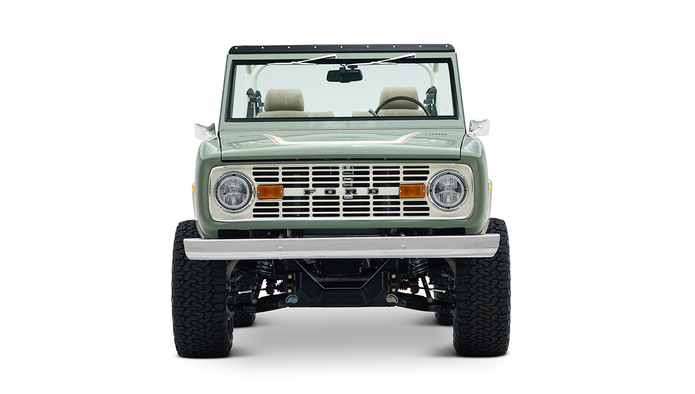 Classic Ford Bronco front view showcasing grille, headlights, and front bumper
