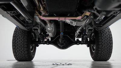 Underneath view of rear axle, drive shaft, and exhaust system of Classic Ford Bronco