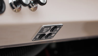 Control panel with buttons for gear shifts and drive modes in Classic Ford Bronco