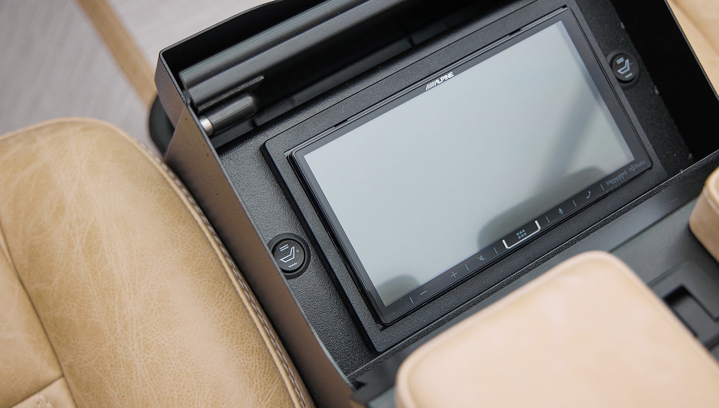 Center console in Classic Ford Bronco featuring an Alpine touchscreen display