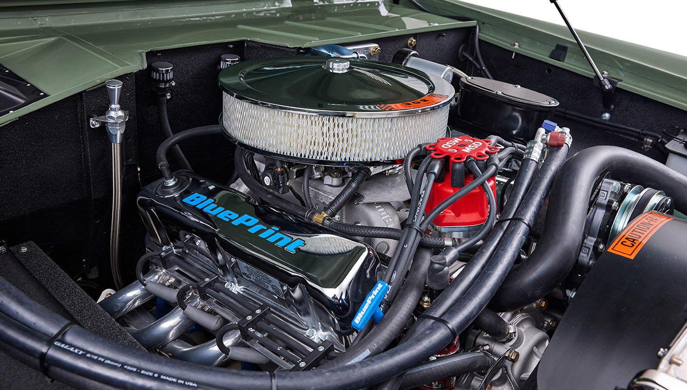 Close-up of BluePrint branded engine parts inside Classic Ford Bronco engine bay.