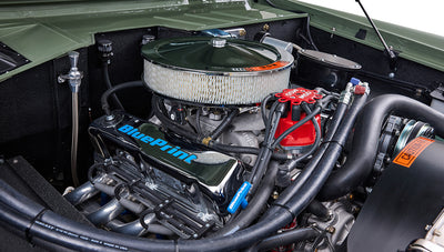 Close-up of BluePrint branded engine parts inside Classic Ford Bronco engine bay.