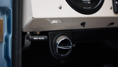 1973 Ford Bronco in Brittany Blue over Whiskey leather vent