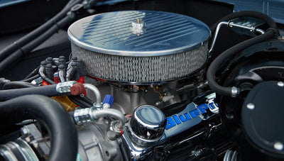 1973 Ford Bronco in Brittany Blue over Whiskey leather engine detail