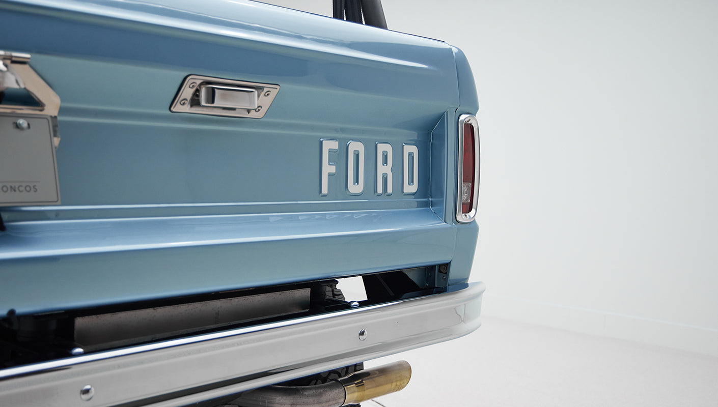 1973 Ford Bronco in Brittany Blue over Whiskey leather ford logo