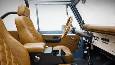 1973 Ford Bronco in Brittany Blue over Whiskey leather interior detail