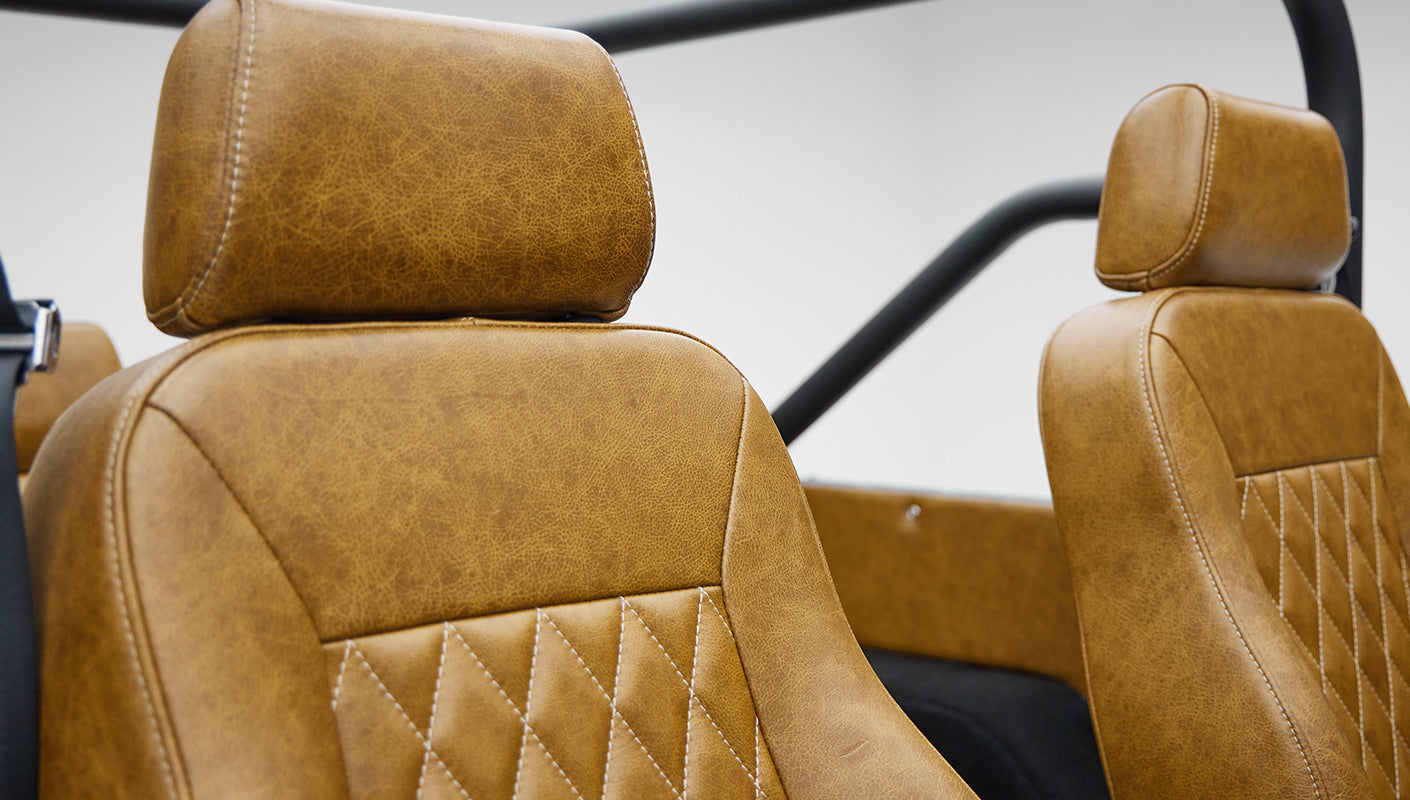 1973 Ford Bronco in Brittany Blue over Whiskey leather seat detail