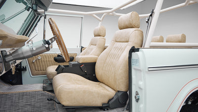 1973 classic ford bronco in diamond blue with butterscotch leather interior, vintage decals and chrome trim driver seat