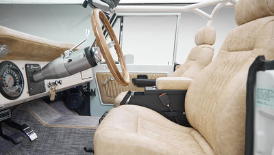 1973 classic ford bronco in diamond blue with butterscotch leather interior, vintage decals and chrome trim interior detail