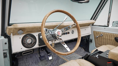1973 classic ford bronco in diamond blue with butterscotch leather interior, vintage decals and chrome trim steering wheel