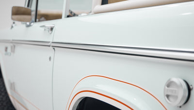 1973 classic ford bronco in diamond blue with butterscotch leather interior, vintage decals and chrome trim