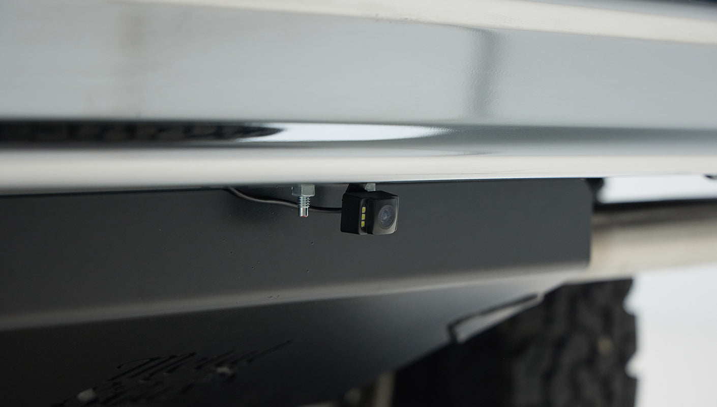 Mounted backup camera under rear bumper of Classic Ford Bronco