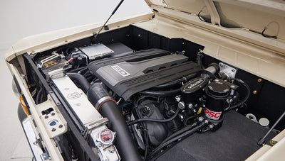 Detailed view of engine bay of Classic Ford Bronco focusing on Wilwood master cylinder and PSC components