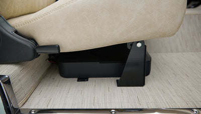 Part of beige front seat showing metal seat track and underside of seat in Classic Ford Bronco