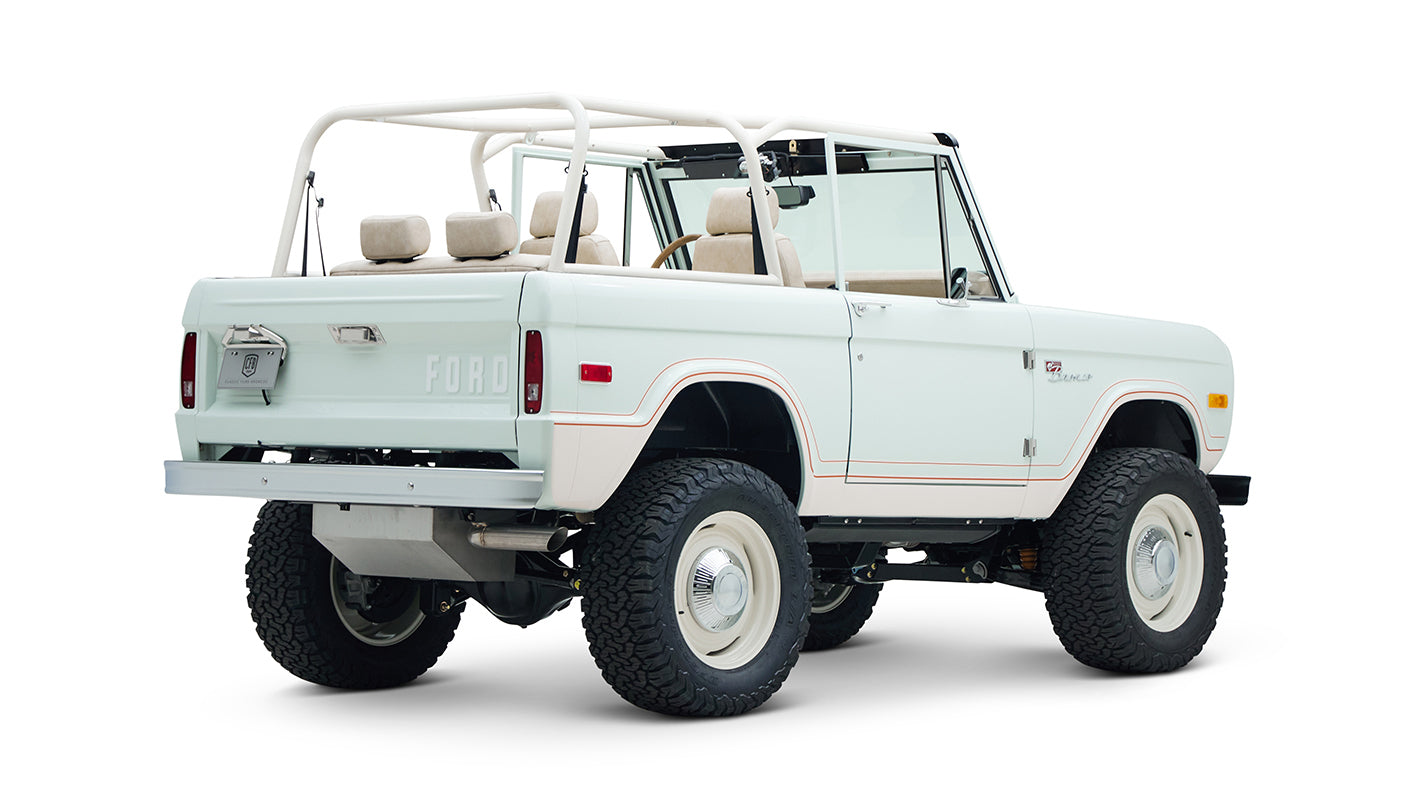 Rear view of white Classic Ford Bronco 1974 Diamondblue Coyote Series off-road vehicle