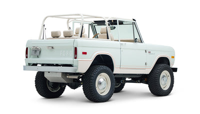 Rear view of white Classic Ford Bronco 1974 Diamondblue Coyote Series off-road vehicle
