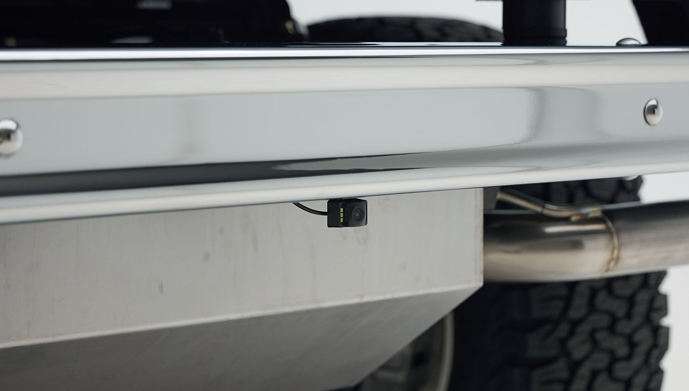 Underneath view showing small rear camera mounted under the Classic Ford Bronco rear bumper
