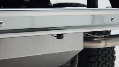 Underneath view showing small rear camera mounted under the Classic Ford Bronco rear bumper