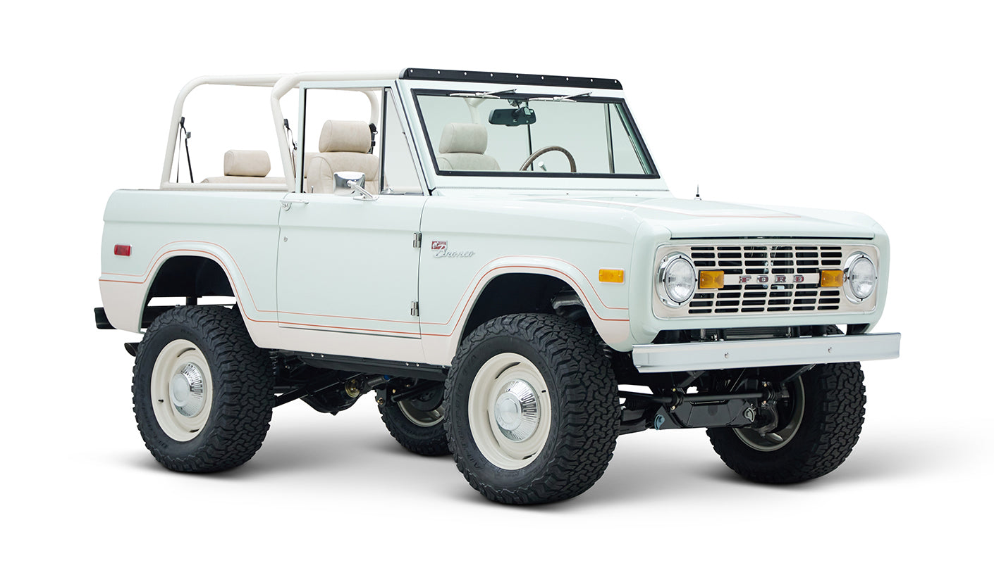 Side view of white Classic Ford Bronco 1974 Diamondblue Coyote Series with no roof