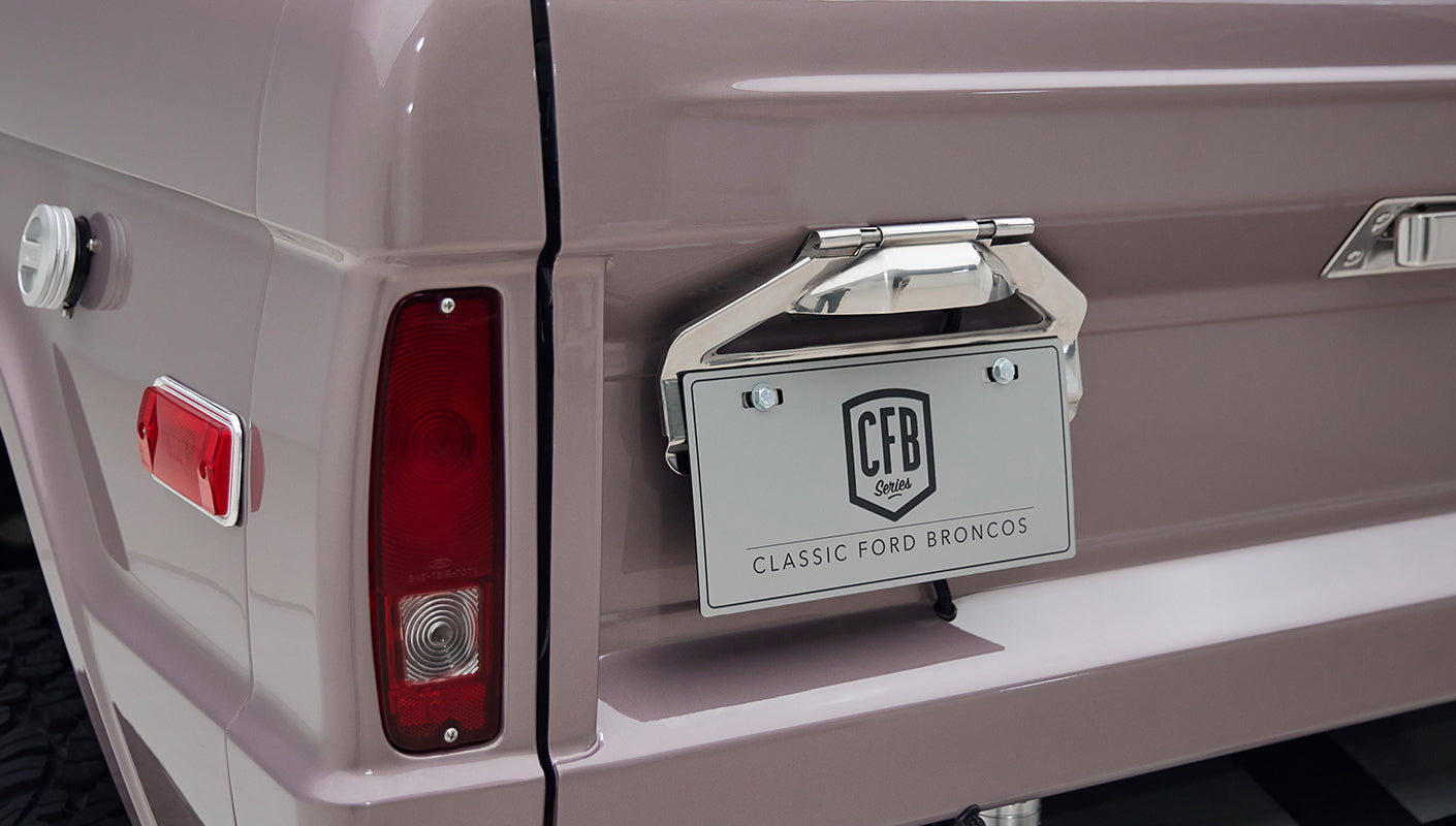 Close-up of back corner and taillights with Classic Ford Broncos branded license plate