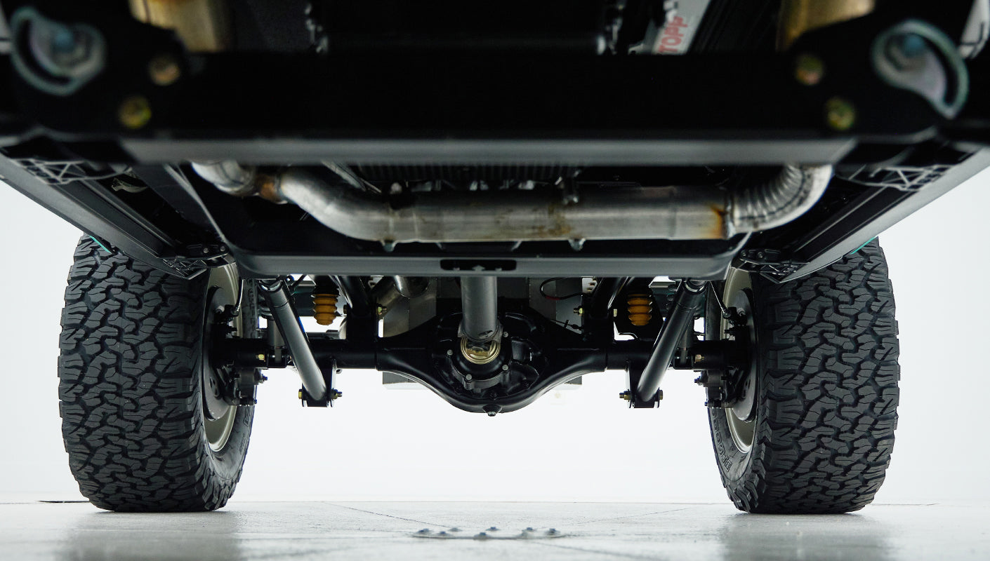 Rear axle and suspension components viewed from beneath Classic Ford Bronco