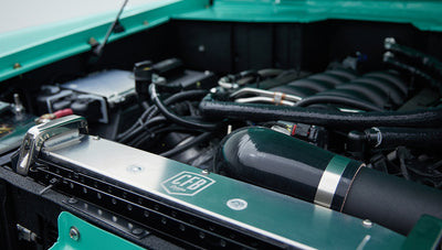 Close detail of engine bay showing branded radiator and air intake components in Classic Ford Bronco
