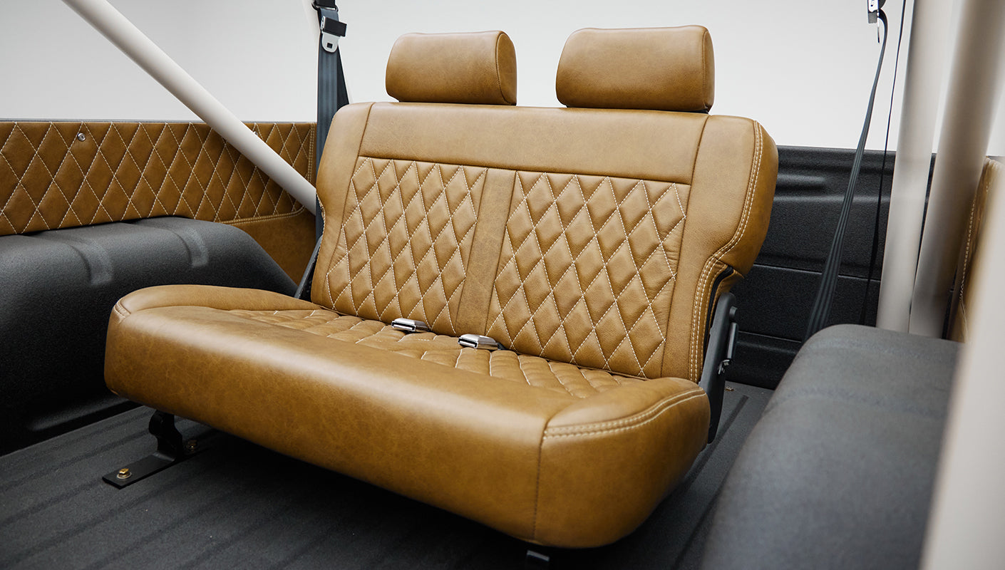 1974 classic ford bronco in stars & stripes blue with whiskey leather rear seat