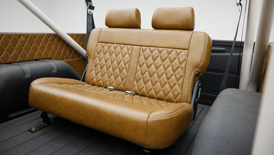 1974 classic ford bronco in stars & stripes blue with whiskey leather rear seat