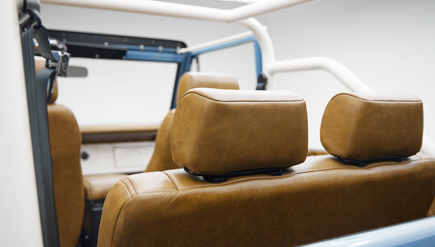 1974 classic ford bronco in stars & stripes blue with whiskey leather headrests