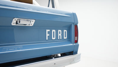 1974 classic ford bronco in stars & stripes blue with whiskey leather logo