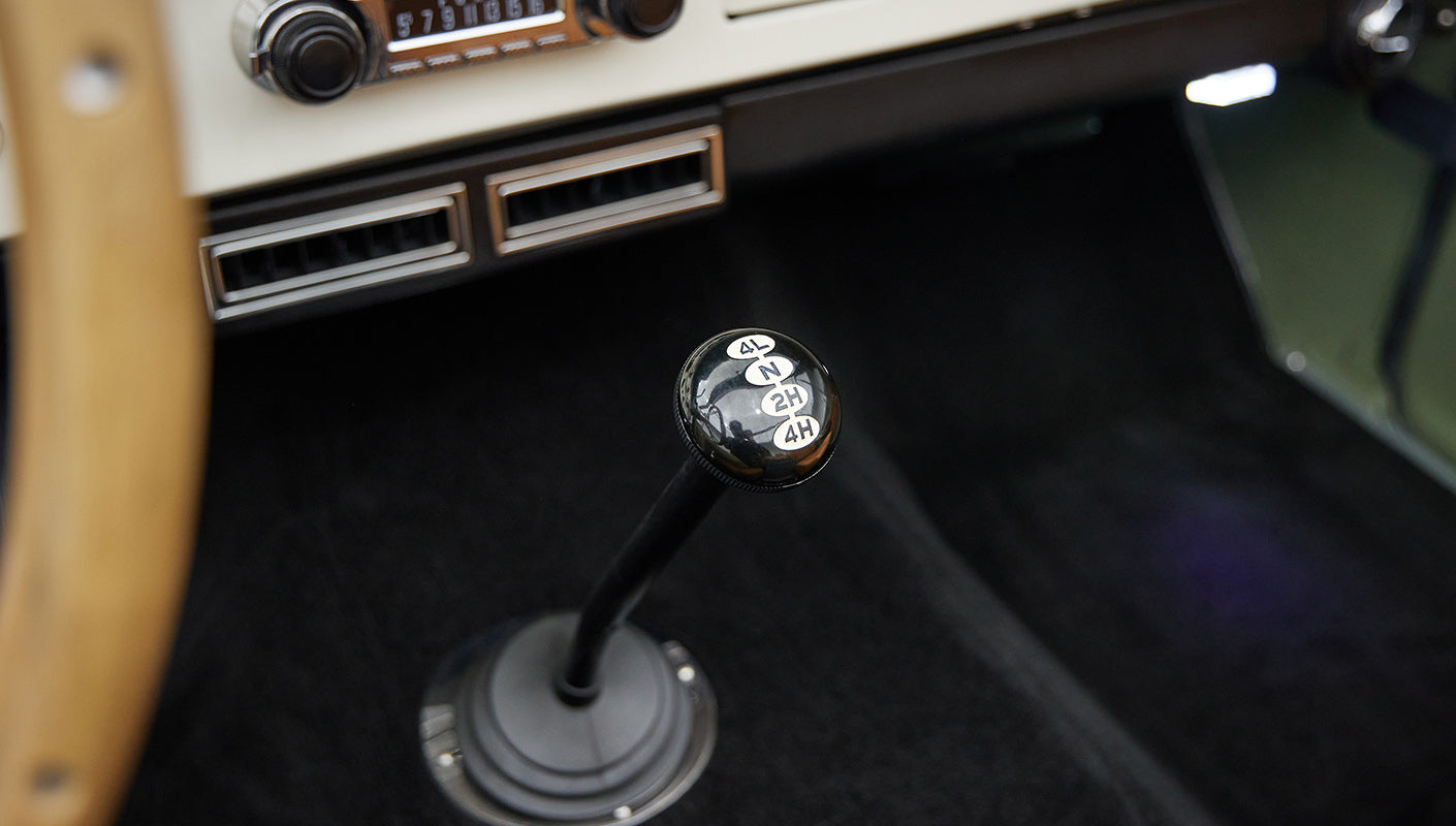 1976 classic ford bronco in boxwood green with ball glove leather transfer case
