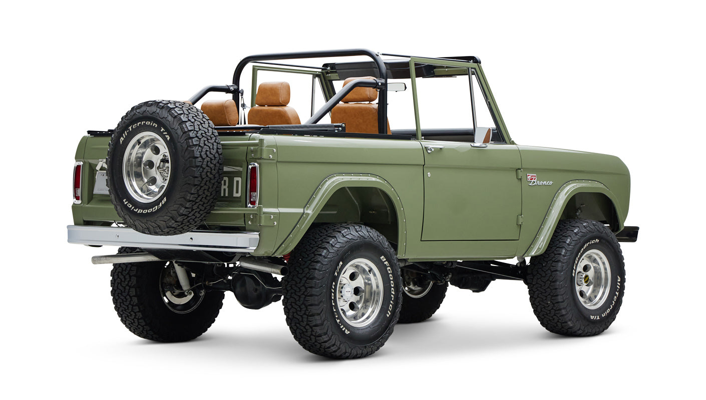 1976 classic ford bronco in boxwood green with ball glove leather rear passenger angle
