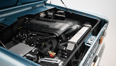 1975 ford bronco painted brittany blue with 3rd gen ford racing coyote motor