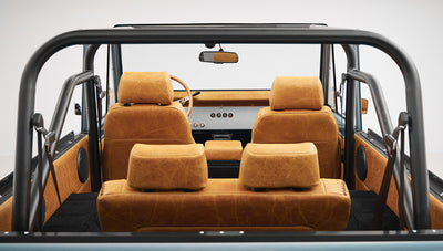 1975 ford bronco painted brittany blue with cowboy debossed, baseball stitch leather interior seats