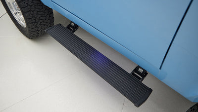 A 1976 Classic Ford Bronco is Frozen Blue over White Rock leather with power step