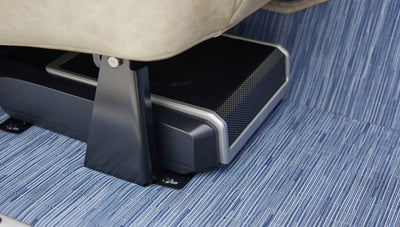 A 1976 Classic Ford Bronco is Frozen Blue over White Rock leather subwoofer