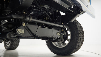 A 1976 Classic Ford Bronco is Frozen Blue over White Rock leather roadster shop chassis independent suspension