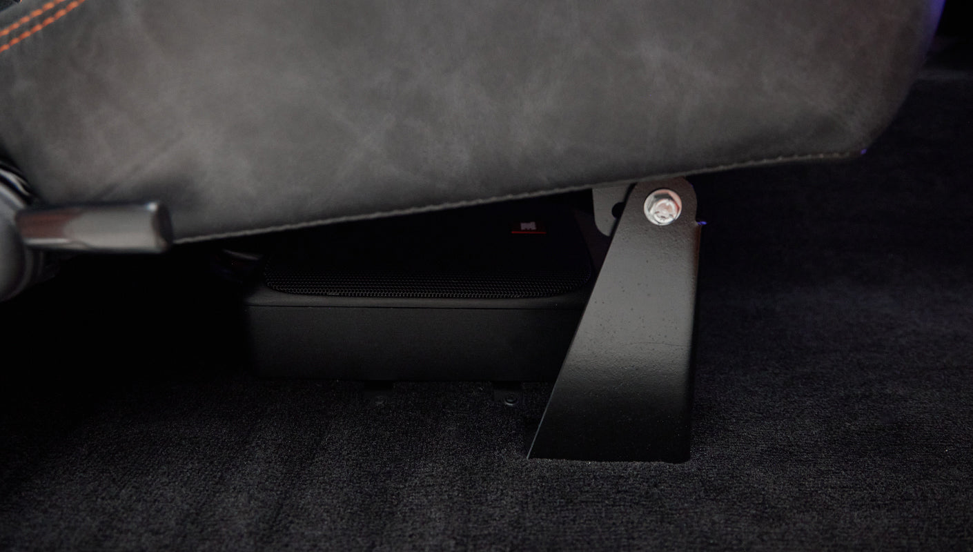Speaker system mounted under the seat inside Classic Ford Bronco interior