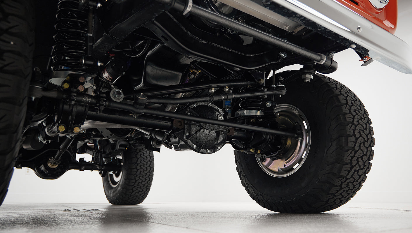 View of rear axle and suspension components underneath Classic Ford Bronco