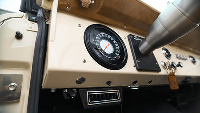 Classic Ford Bronco dashboard with speedometer and vintage controls