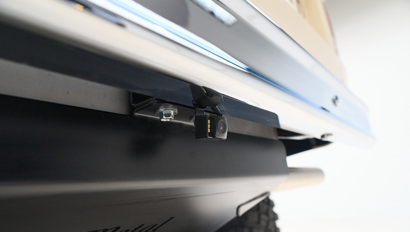 Rear-view backup camera mounted under Classic Ford Bronco bumper