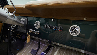 1966 ford bronco in highland green with whiskey leather interior dash detail