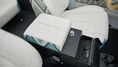Close-up of center console with armrest and control panel inside Classic Ford Bronco
