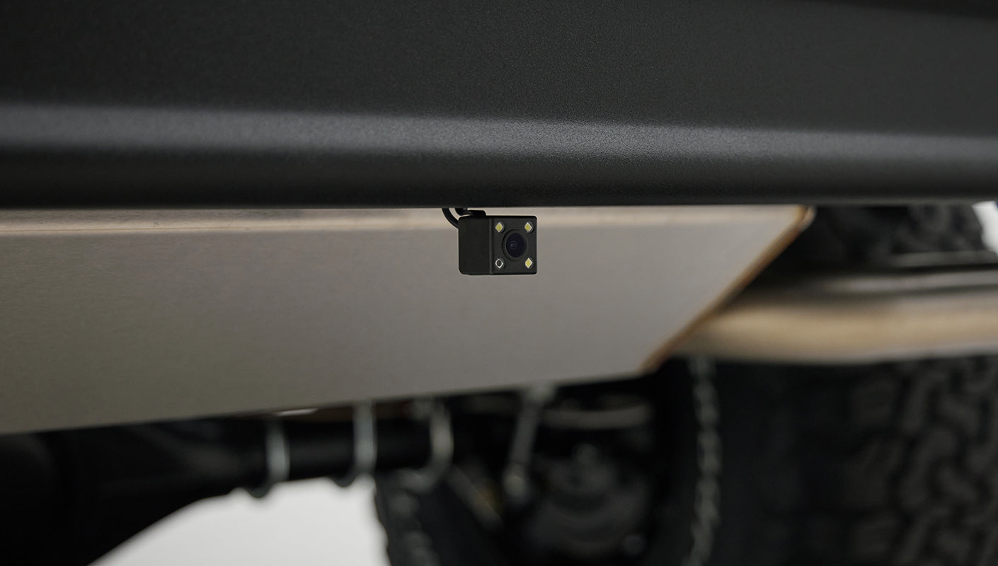 Rear view of backup camera mounted under rear bumper on Classic Ford Bronco